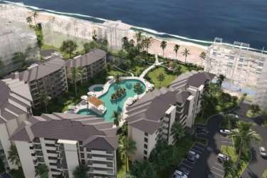 Aerial of beachfront resort complex with pools, gardens, and beach access PH Olas del Mar Punta Chame