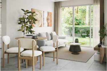 Open plan living dining with big glass doors opening to patio at PH Aires del Mar Playa Caracol