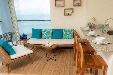 Private tropical beach with palm trees, lounge chairs, and umbrellas PH Ventanas del Mar Punta Chame