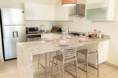 Spacious open plan living and dining with sliding doors to terrace PH Ventanas del Mar Punta Chame Panama