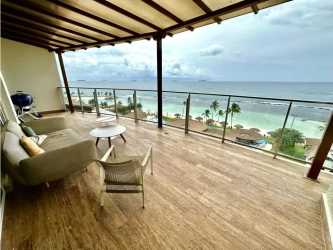 Spacious oceanfront balcony lounge with panoramic Caribbean Sea view in PH Playa Escondida