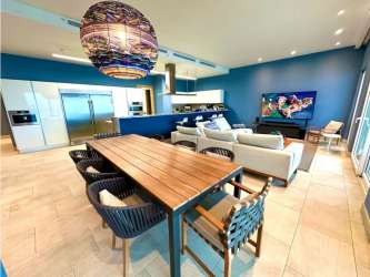 Bedroom with window ocean views neutral tones Playa Escondida Maria Chiquita Panama