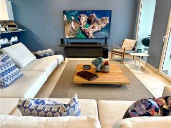 Contemporary spacious living room with large sectional sofa and ocean view Playa Escondida Colon Panama