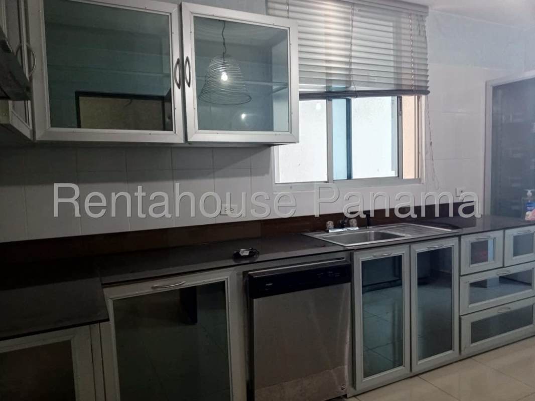 Balcony with glass railing, safety net, overlooking ocean and Panama City skyline at PH Serenity at the Bay