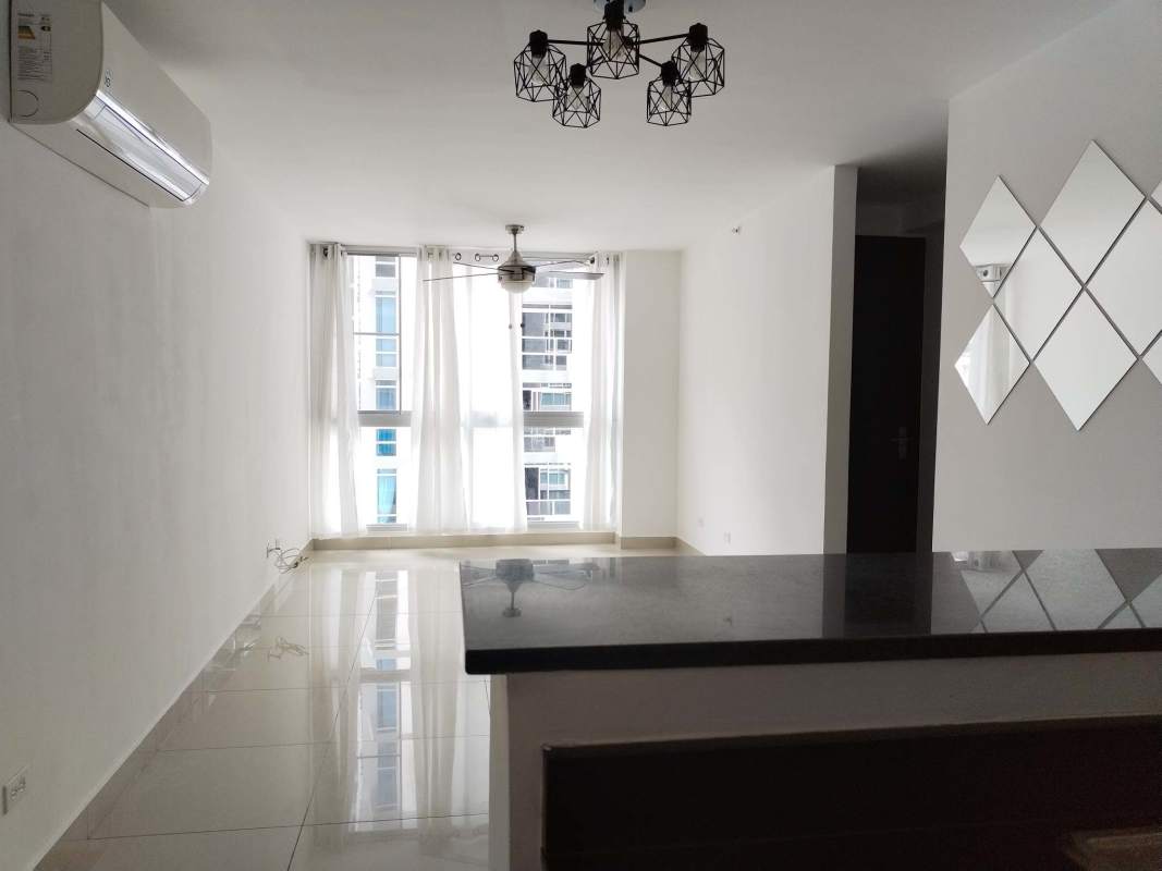 Apartment kitchen with granite countertops, light cabinetry, appliances, washer and dryer PH Carrasquilla Park Panama