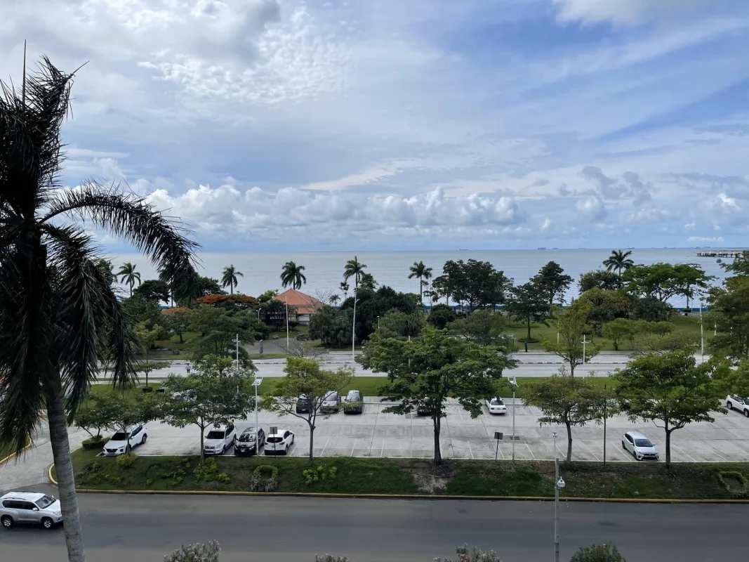Furnished oceanfront bedroom panoramic windows PH BICSA Financial Center Panama