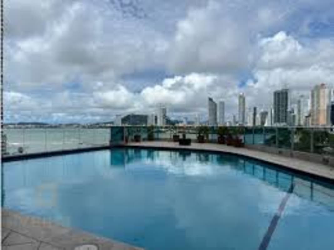 Spacious open living dining room with floor to ceiling windows, city and ocean views in PH The Point Panama