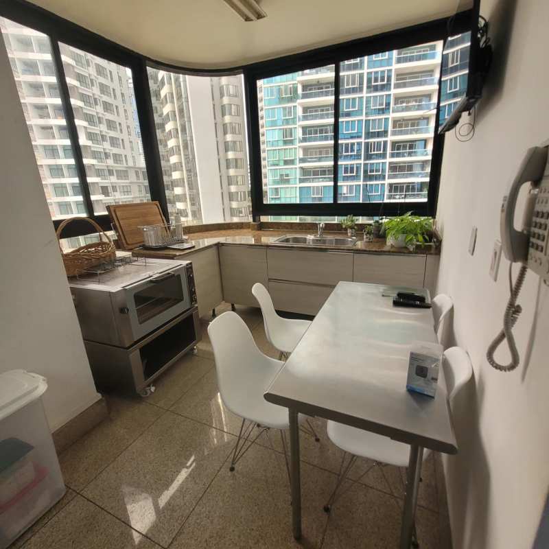 Large kitchen with panoramic windows, stainless appliances, granite counter Mirage Penthouse Punta Paitilla