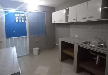 Empty bedroom with barred window, tile floor in affordable townhouse in Arraiján Panama