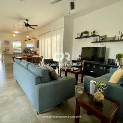 Modern bathroom with glass enclosure, vanity, ceramic walls Punta Barco Panama