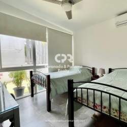 Modern bedroom with AC, blinds, double bed in Punta Barco Panama