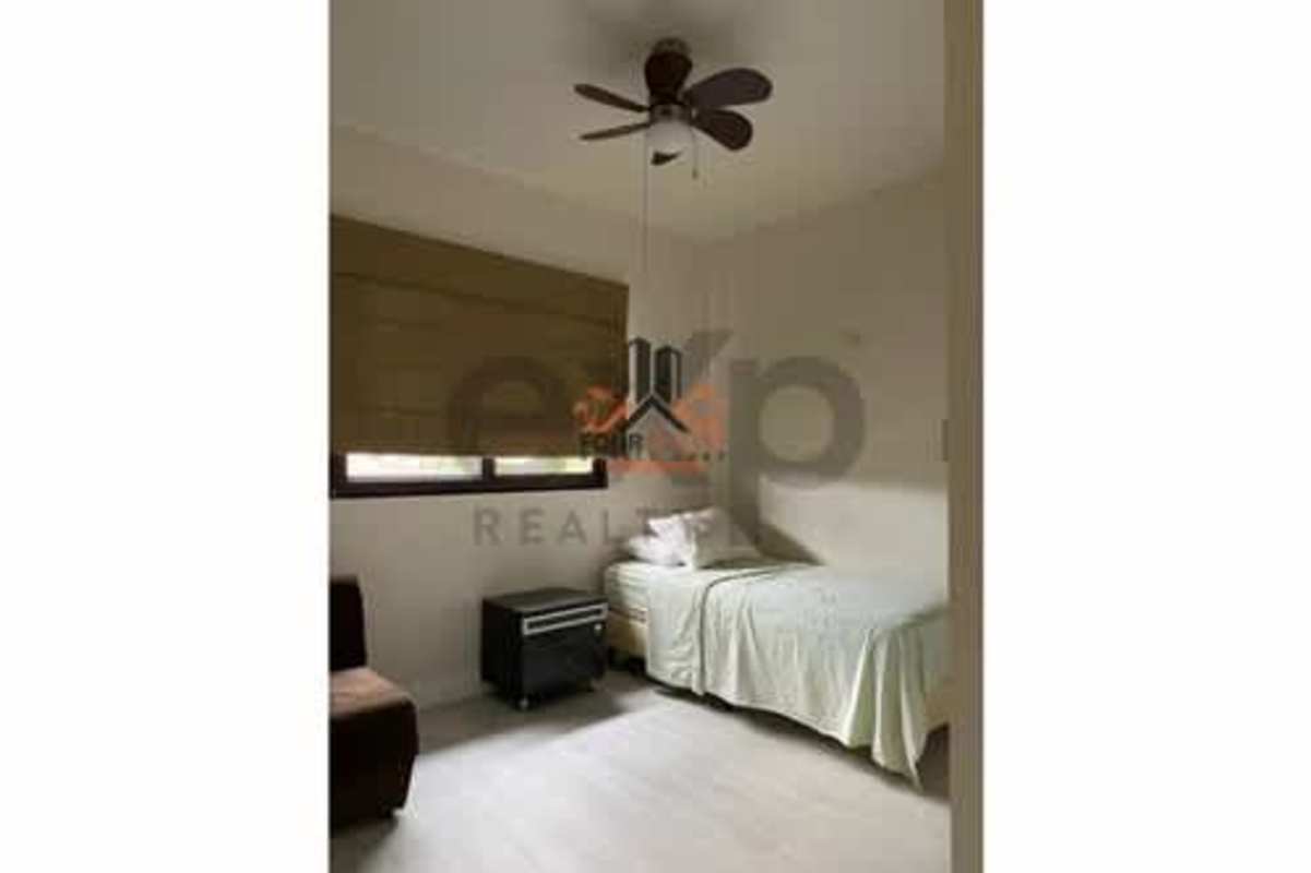 Walk-in closet built-in shelves, drawers, hanging space in Versalles luxury residence Panama