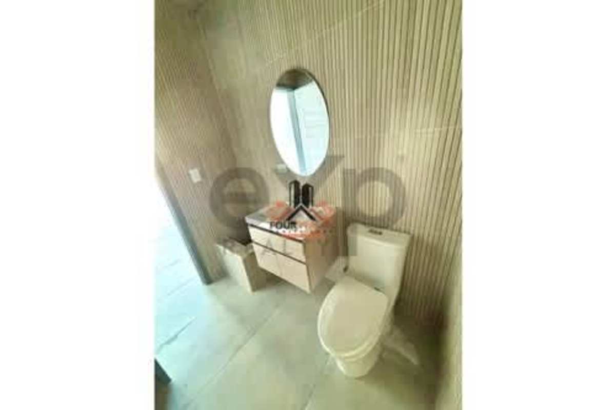 Large open commercial space with tiled flooring and exposed ceiling inside PH Torre Interplus Panama City