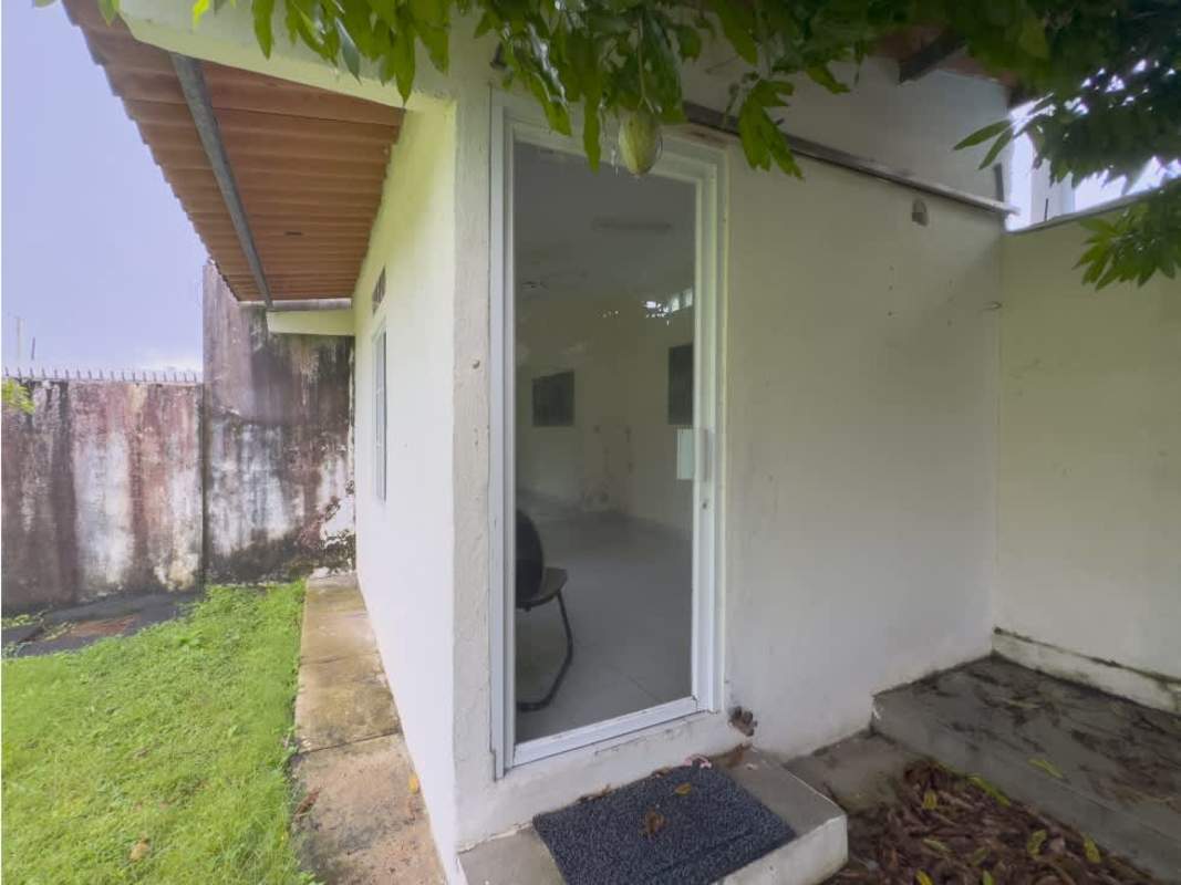 Modern living room with wooden ceiling and sliding glass door in El Carmen Bella Vista Panama