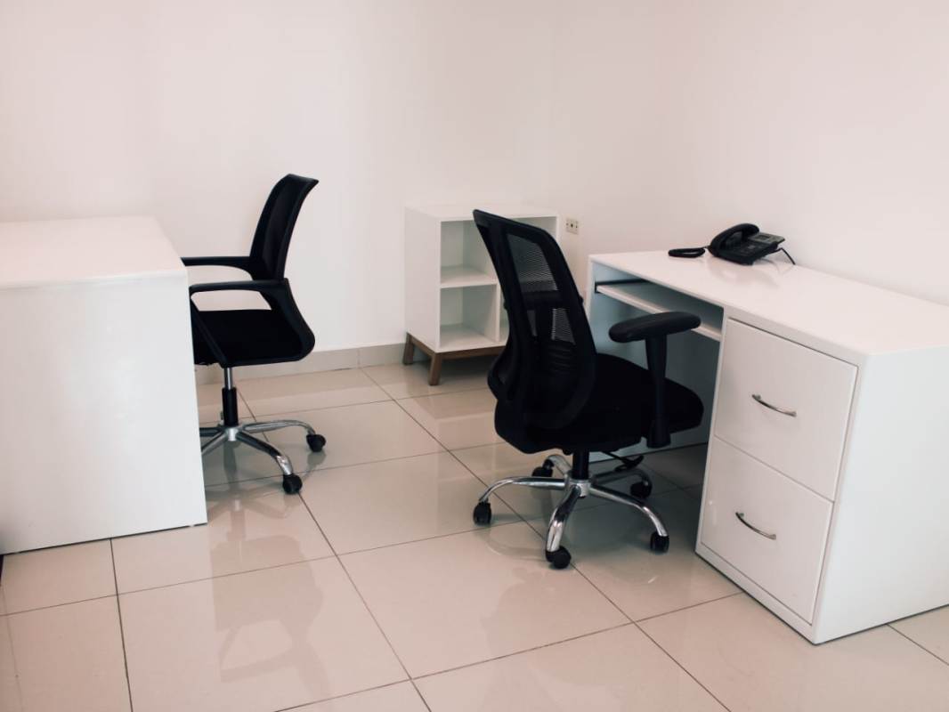Two workspace minimalist office with desks and chairs in PH Ocean Business Plaza Panama City