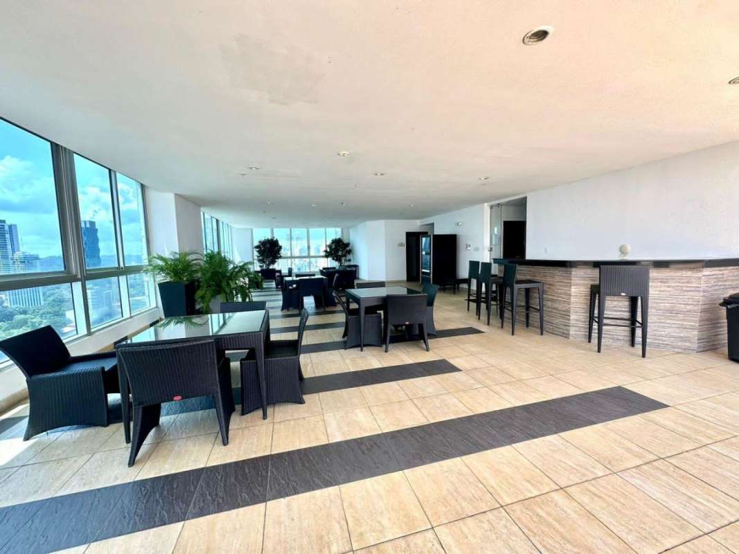 Modern high-rise tower glass balconies oceanfront PH Villa del Mar Avenida Balboa Panama