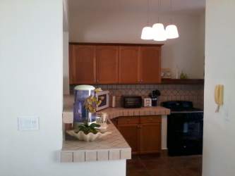 Cozy bedroom with four-poster bed, window garden views PH Los Portales Buenaventura