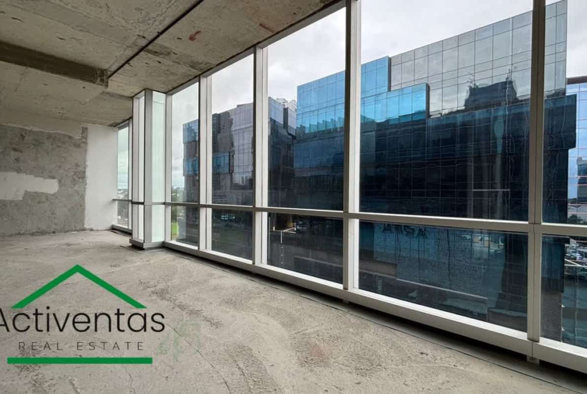 Panoramic windowed unfinished commercial space PH Torre Arifa core and shell in Santa María