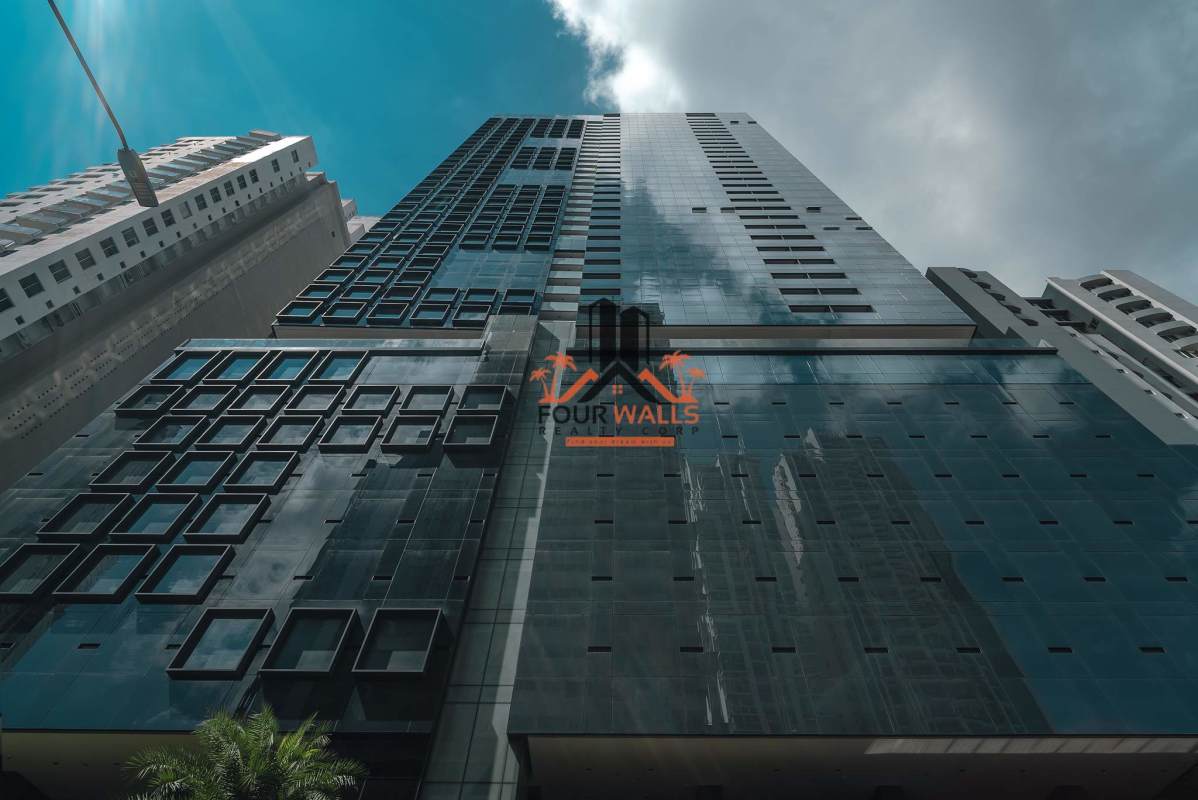 Branded luxury condo tower exterior with Armani Casa furnishings signage in Bella Vista Panama City