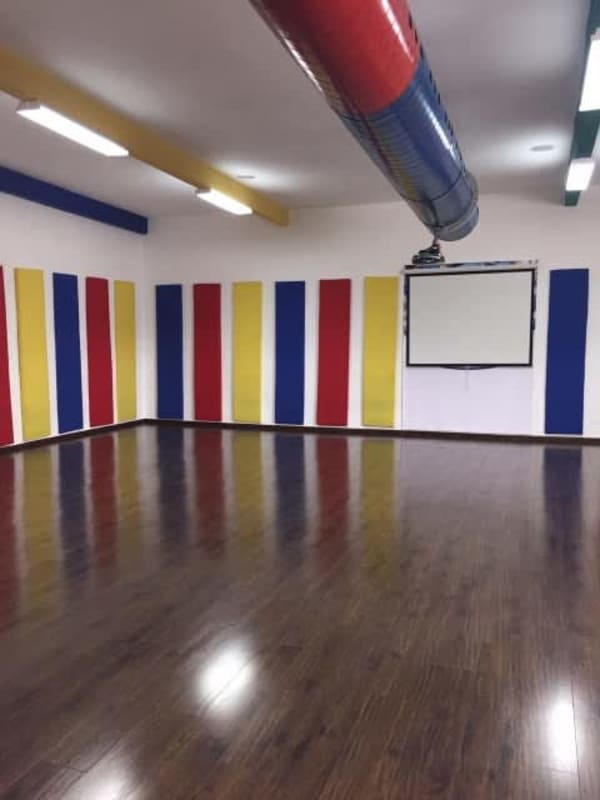 Indoor playground with artificial turf and toys in San Francisco Panama commercial center