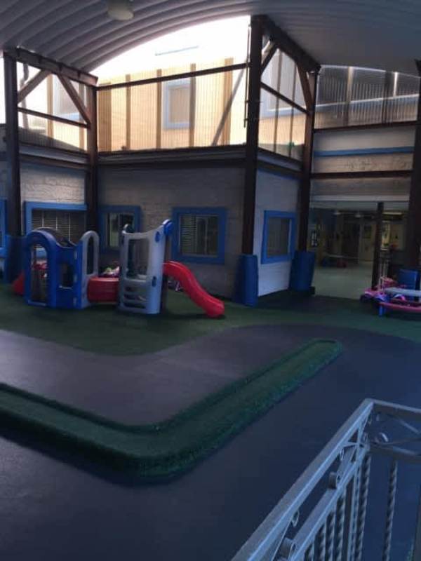 Multipurpose studio with colorful wall acoustic panels and wood floor Panama