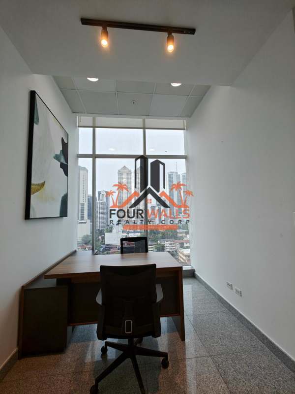 Modern office space with floor-to-ceiling window city skyline view in PH Habitats Plaza