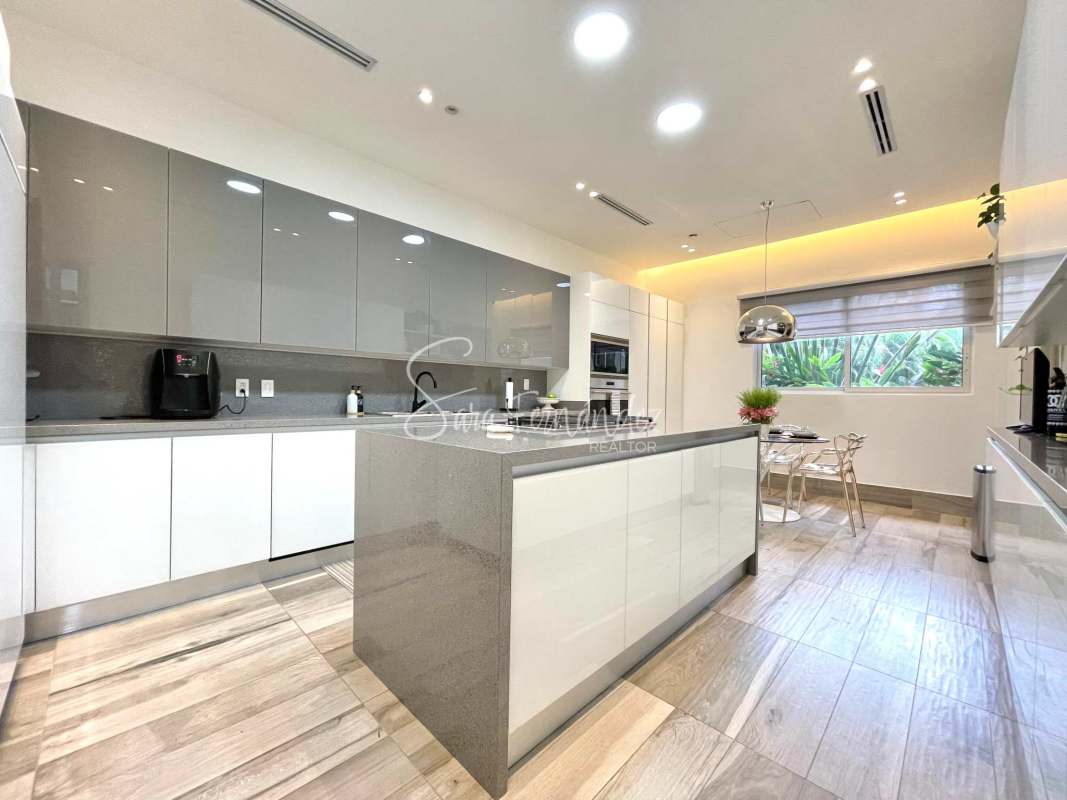 Luxury bathroom with marble walls, double sink vanity and premium fixtures in The Reserve Santa Maria