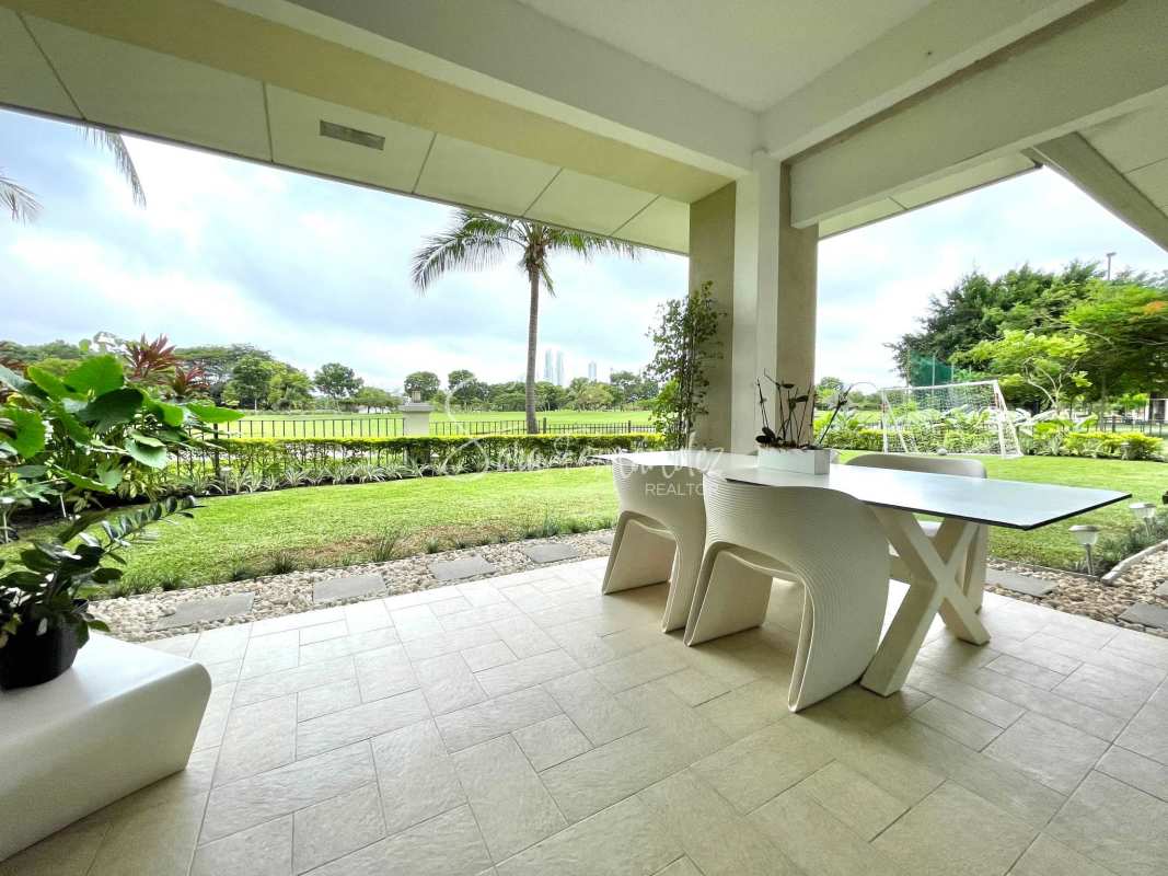 Large bedroom with marble flooring, floor-to-ceiling windows and stunning Santa Maria Golf views