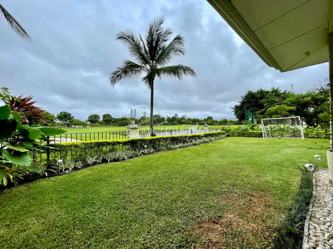 Luxury marble finished living dining area with large glass doors to terrace overlooking Santa Maria Golf