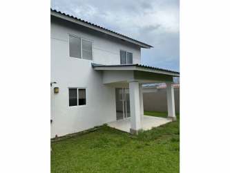 Bright living room with ceramic tile floors and large sliding doors PH Las Olas Playa Dorada Arraiján Panama