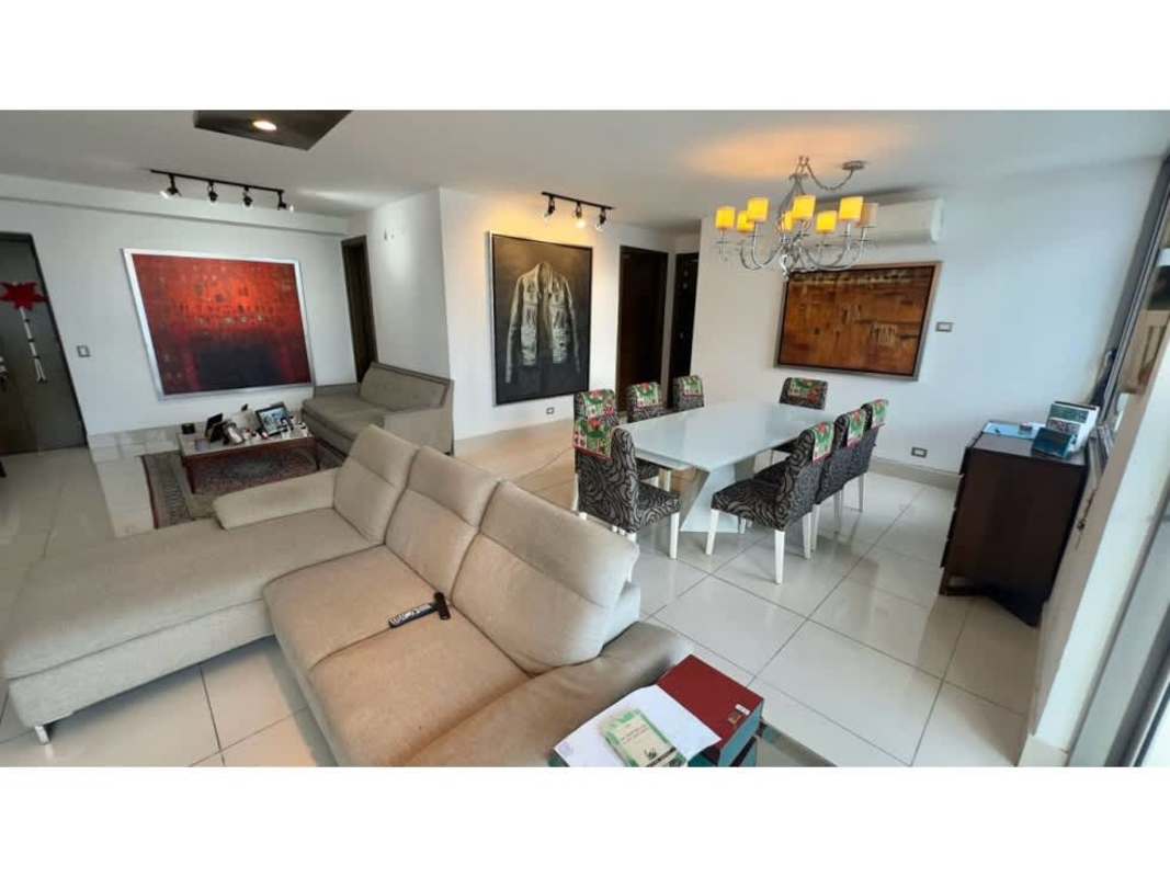 Spacious open-concept living and dining area with large windows in PH Bali Costa del Este Panama