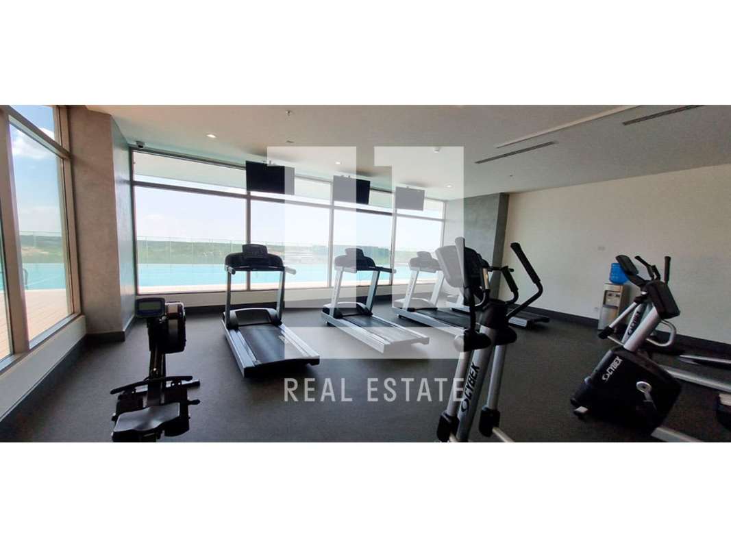 Elegant condominium lobby with concierge at PH Green Garden Santa Maria Panama City