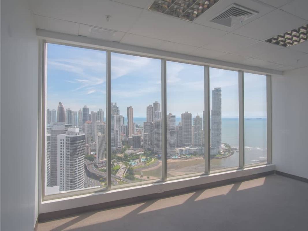 Modern open workspace empty office with panoramic skyline views in PH BICSA Financial Center Panama City