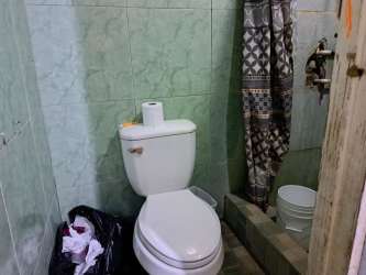 Basic bathroom with shower and toilet in family home Rio Hato Coclé