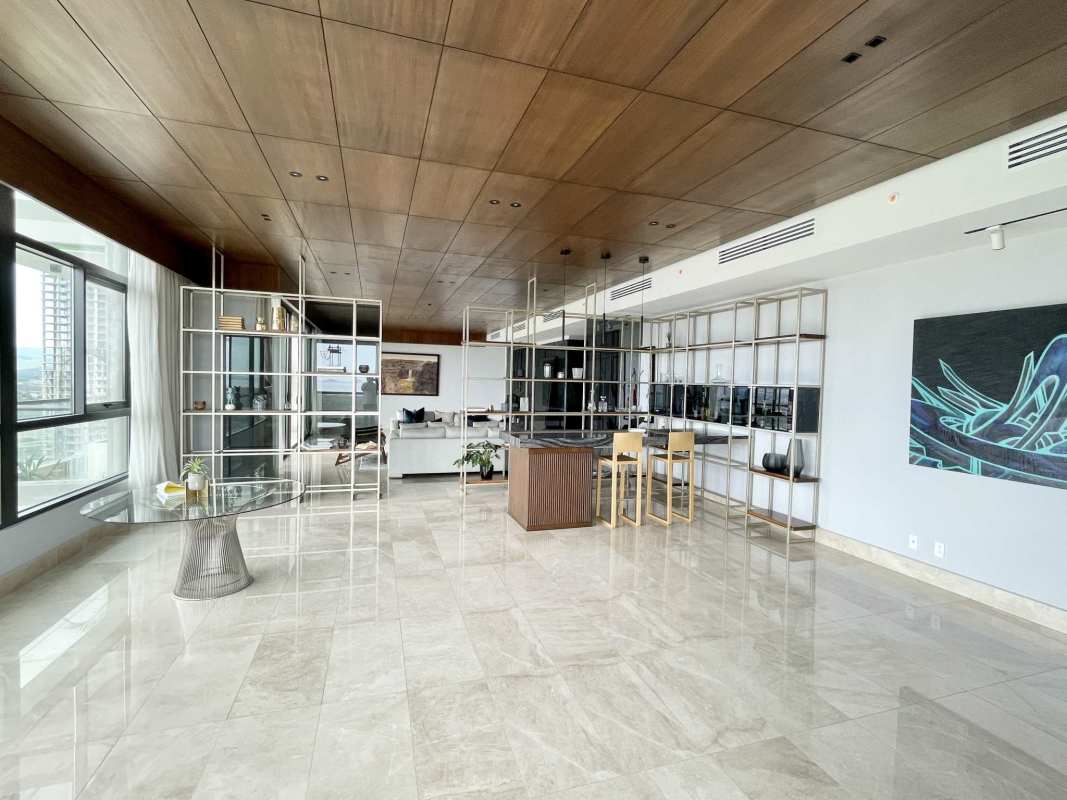 Modern living room with floor-to-ceiling windows and marble floors at PH Albatross Santa María Panama