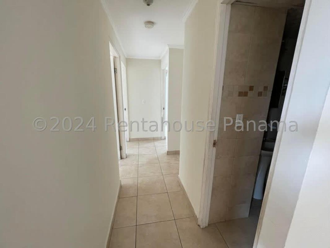 Bathroom with ceramic tile walk-in shower pedestal sink PH Las Palmeras Panama City