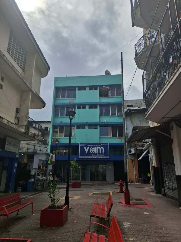 Multi-story building with ground commercial units and apartments above Santa Ana Panama