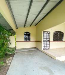 Spacious grassy backyard with mature trees at house for sale Chiriqui