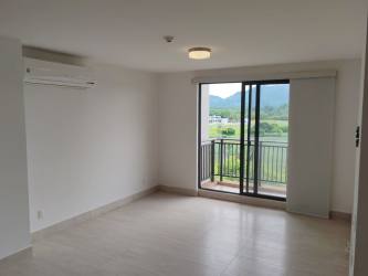 Contemporary kitchen with stainless appliances in River Valley Panama Pacífico apartment