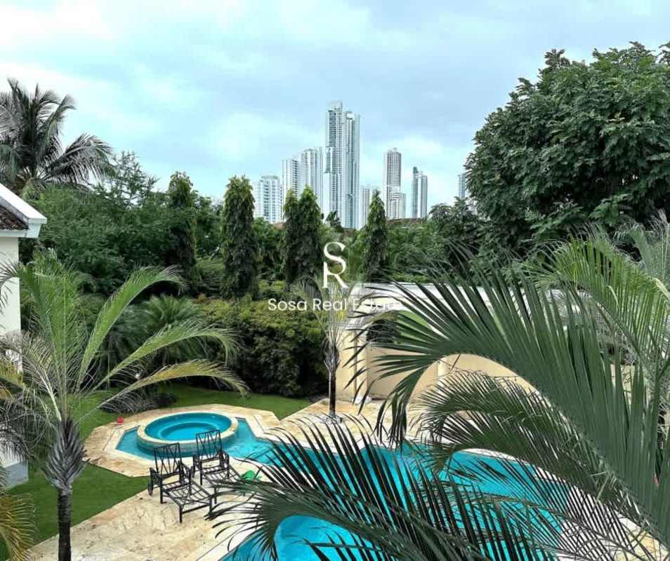 Contemporary living room, large windows, natural light, Costa del Este luxury property Panama