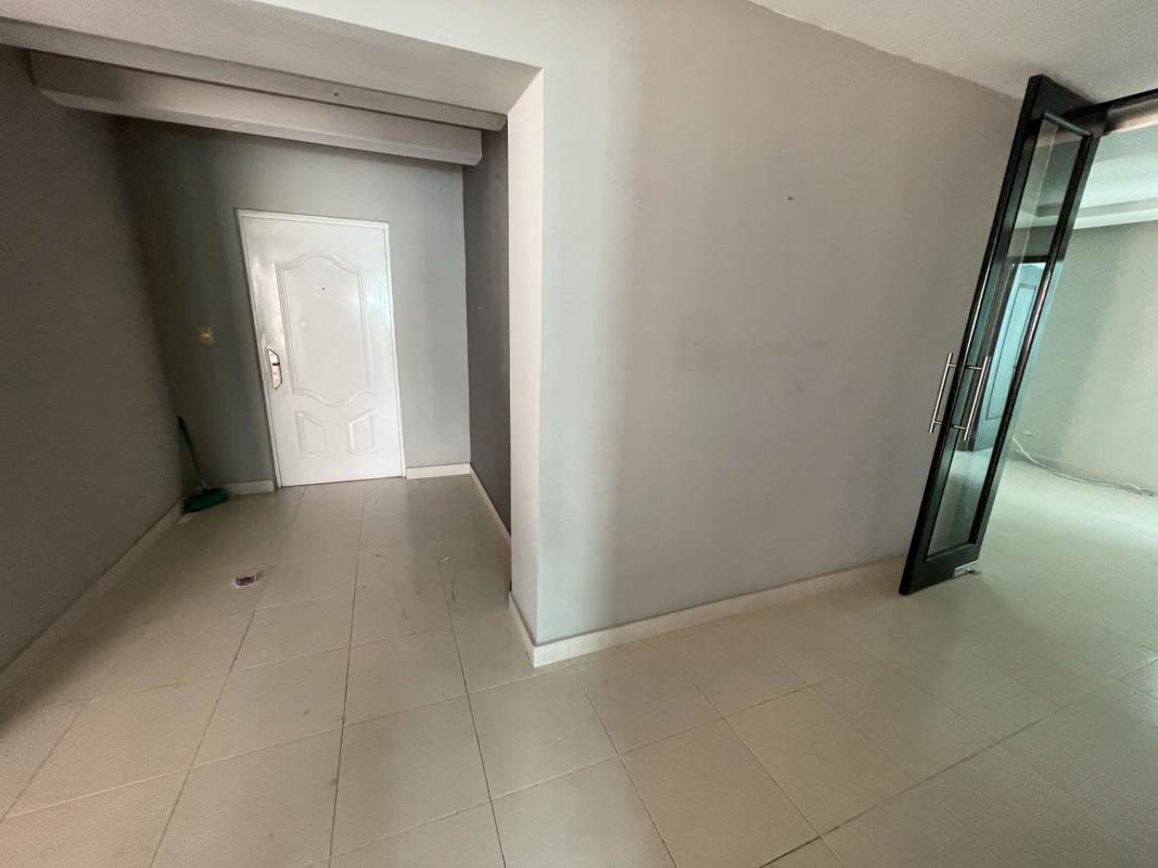 Bathroom with glass-enclosed shower and granite vanity in PH Tao Panama