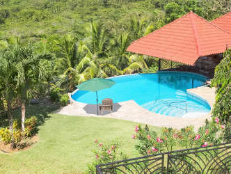 Infinity pool with bamboo structure pavilion mountain views Chiriquí