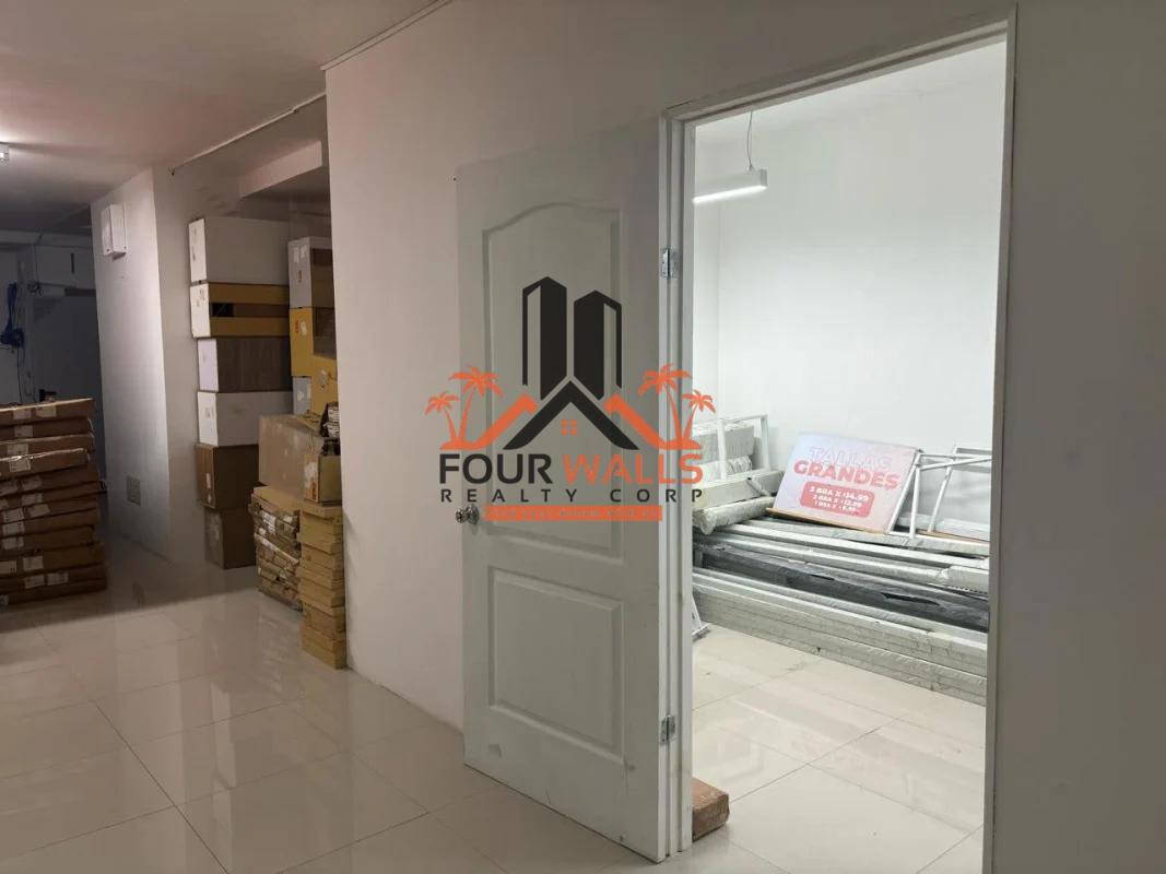 Open retail commercial space with tiled floors and white walls at Signature Point Obarrio Panama City