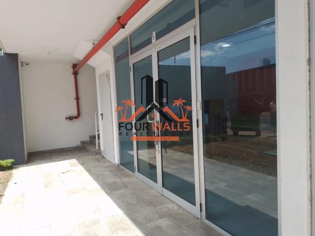 Facade of contemporary commercial plaza Signature Point in Obarrio Panama with parking