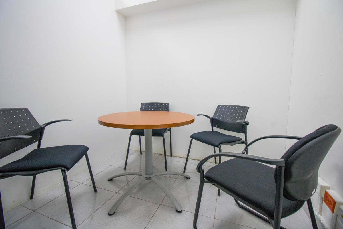 Cozy meeting room with round table and chairs commercial space Albrook