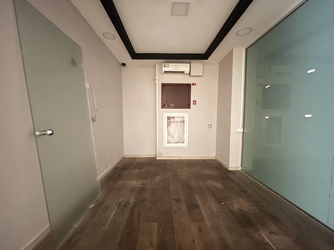 Modern office with glass walls and AC at PH Plaza El Cangrejo commercial rental Panama