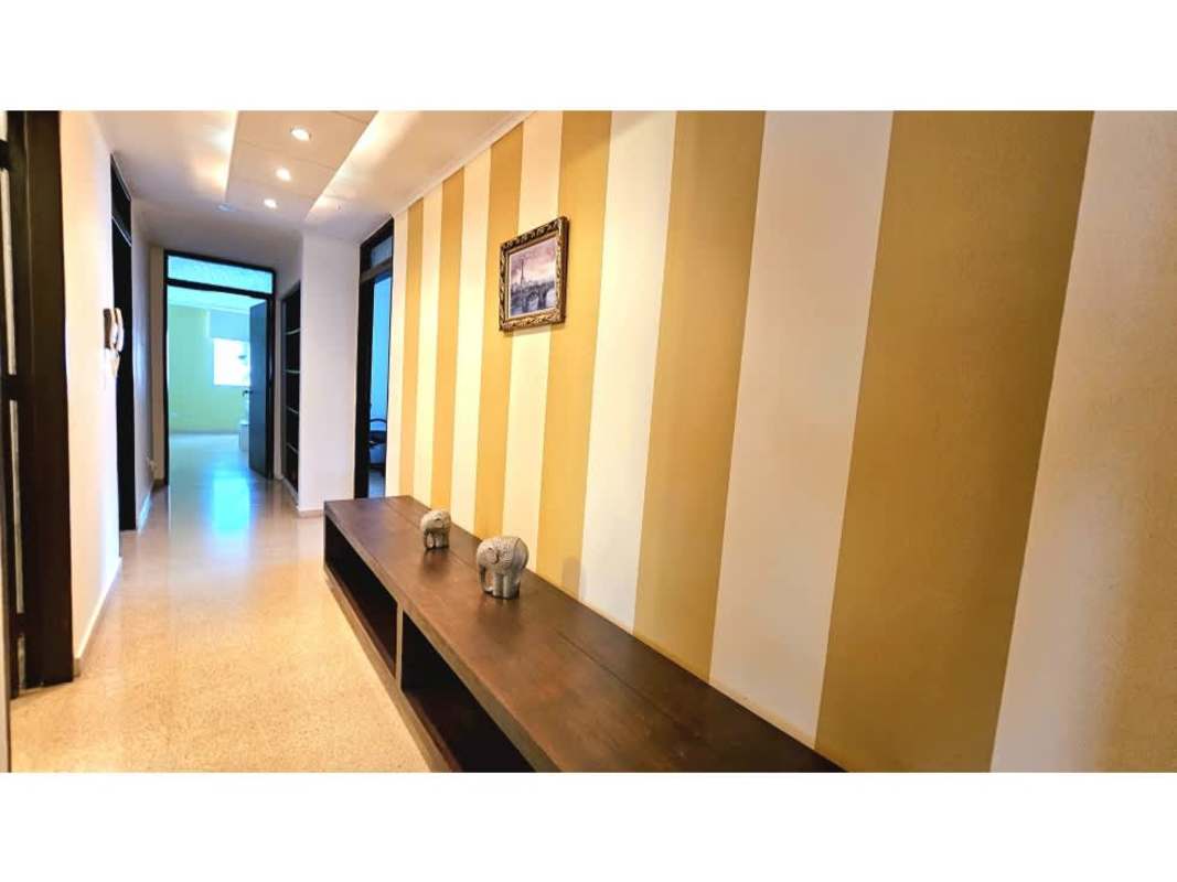 Spacious kitchen with granite counters, wood cabinets in PH Villa Magna Punta Paitilla Panama