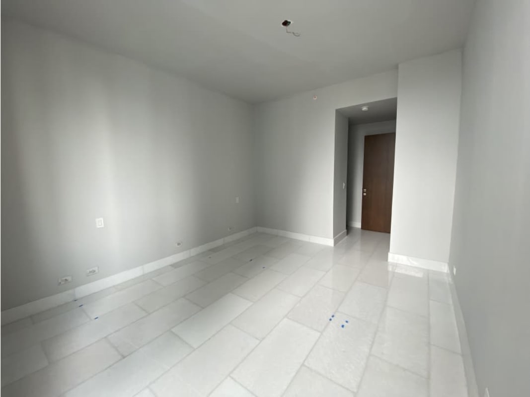 Contemporary kitchen with marble surfaces and city views in PH The Towers Punta Paitilla