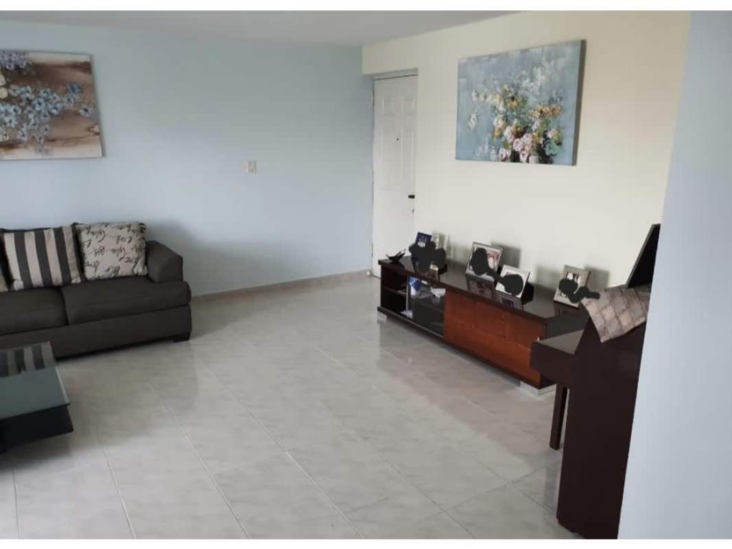 Modern living room with large window, ceramic tile floor at PH Miraluz Punta Paitilla Panama