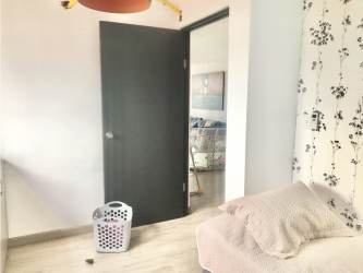 Outdoor swimming pool with lounge chairs in PH Royal Tower Carrasquilla Panama